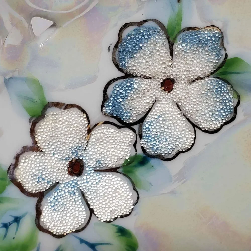EFCCO Teacup and Saucer Blue White Textured Flowers Reticulated Opalescent